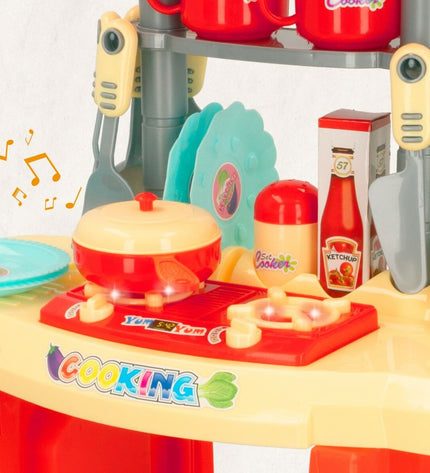 Colorbaby speelgoedkeuken with 23 colorful pretend cooking accessories, measuring 37x47x23 cm, for imaginative play.