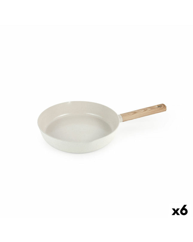 Set of six Quttin kitchen pans, compact and functional cookware for home cooking, shown in a close-up image.