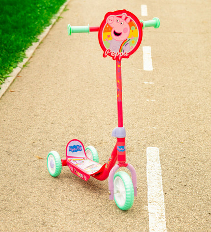 Peppa Pig themed rubber and metal scooter for outdoor urban mobility, designed for children’s active play.