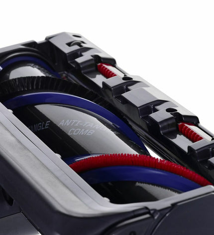 Dyson V15 Detect Absolute steel vacuum cleaner for home cleaning, showing the upright vacuum with digital display and cleaning attachments.