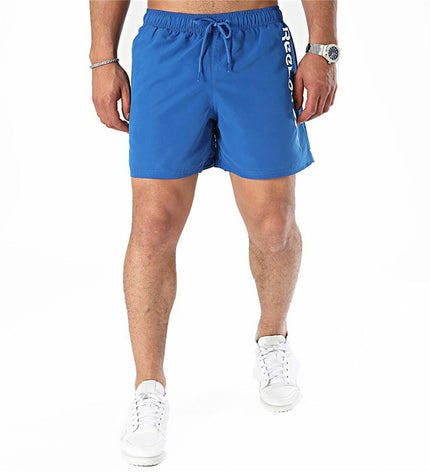 Reebok Yestin men's blue swim trunks for sport and watersport activities, featuring a comfortable fit and quick-drying fabric.