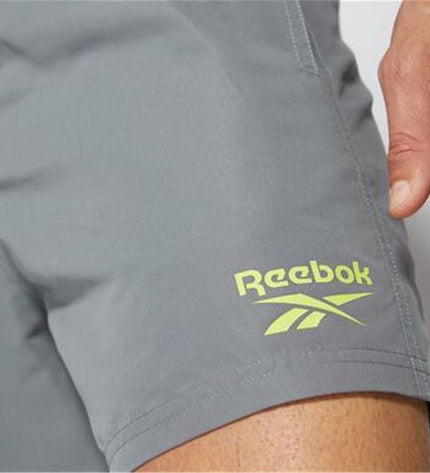 Gray Reebok Yale Essential men's swim shorts for sport and outdoor watersports, featuring a comfortable fit and sporty design.