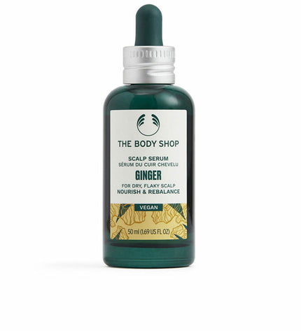 The Body Shop Ginger dietary supplement bottle, 50ml, with natural ginger root imagery on the label.