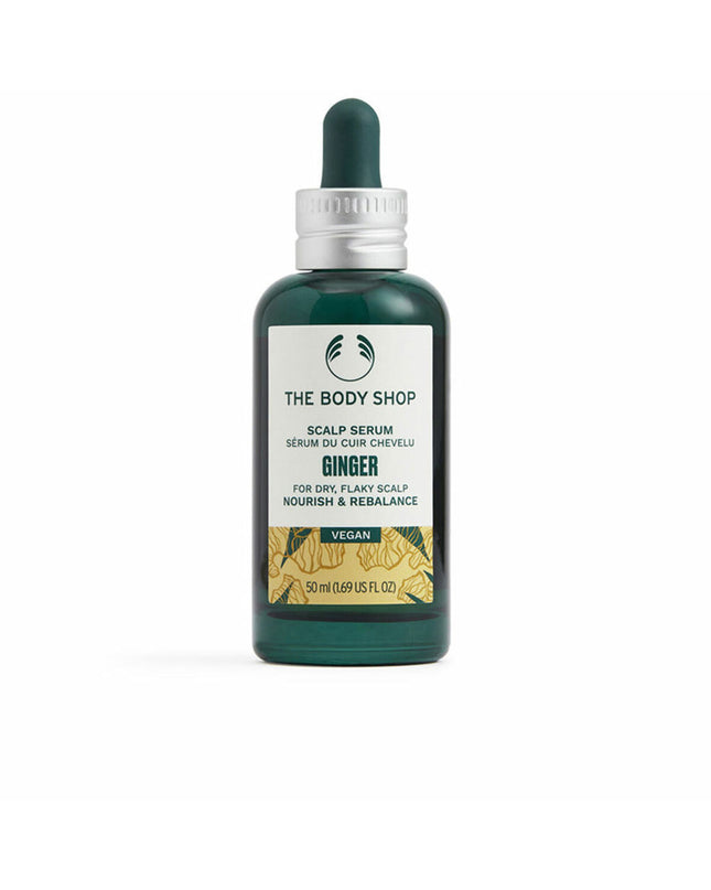 The Body Shop Ginger dietary supplement bottle, 50ml, with natural ginger root imagery on the label.