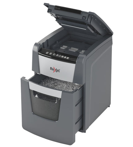 Rexel Optimum Auto+ paper shredder microsnippers for secure document destruction, shown on office desk.