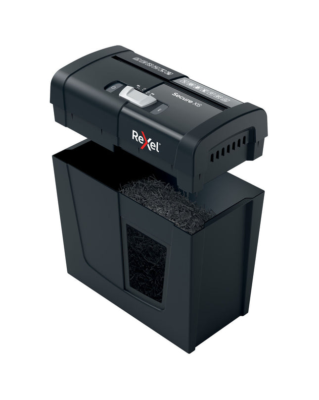 Rexel Secure X6 10L paper shredder for office use, with a black plastic body and paper entry slot in a modern office setting