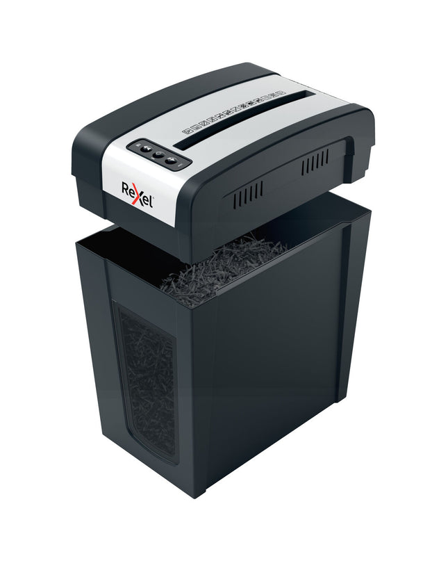 Rexel MC6-SL paper shredder microsnippers for office use, showing the compact shredder with paper inserted for shredding.