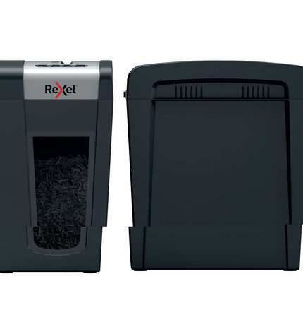Rexel MC6-SL paper shredder, compact office electronics and stationery tool, shown on a desk with shredded paper nearby.
