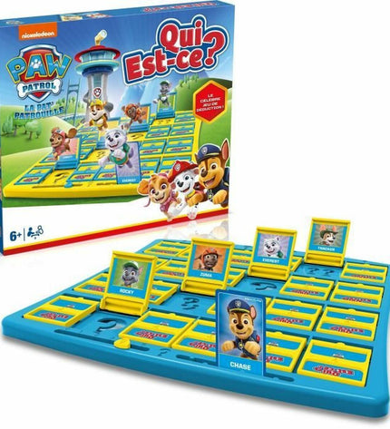 Winning Moves La pat'patrouille Qui est-ce? board game with colorful character cards and game components laid out on a table.