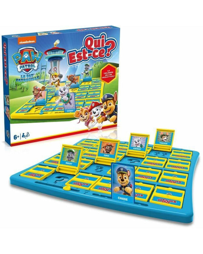 Winning Moves La pat'patrouille Qui est-ce? board game with colorful character cards and game components laid out on a table.