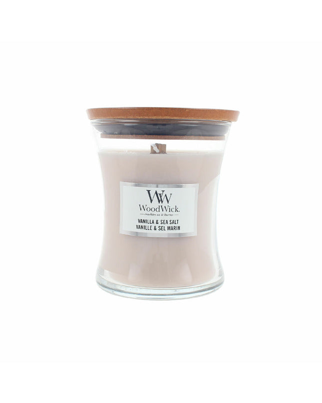Woodwick scented candle in a glass container, featuring a wooden wick for a cozy home decor ambiance.