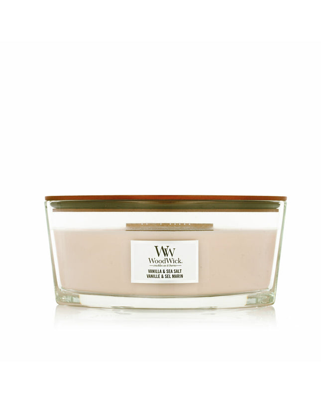 Woodwick Woodwick Vela scented candle in a glass jar, with a wooden wick and warm, inviting glow for home decor.