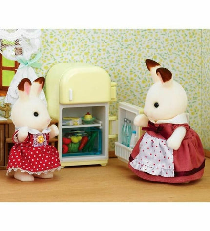 Sylvanian Families Mom Rabbit action figure with refrigerator toy set, detailed plastic doll in a playful scene.