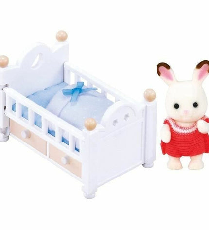 Sylvanian Families Baby Rabbit Chocolate Bed action figure toy, detailed miniature playset for children and collectors