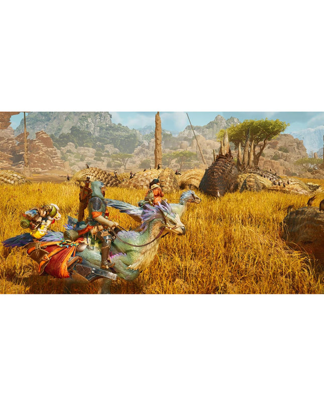 Sony PlayStation 5 console with Monster Hunter Wilds video game case, showcasing the gaming setup and game cover art.
