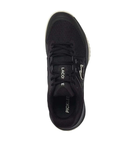 Black Lacoste Power Serve tennis shoes for women, featuring sporty design and athletic sole, ideal for outdoor tennis play.