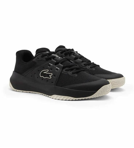 Black Lacoste Power Serve tennis shoes for women, sport and outdoor footwear, with sleek design suitable for tennis players.