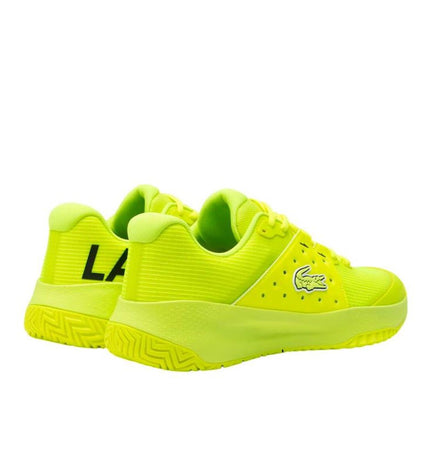 Lacoste Power Serve yellow men's tennis shoes with sporty design, suitable for outdoor tennis and sports activities.