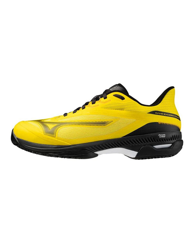 Yellow Mizuno Wave Exceed tennis paddleshoes for adults, designed for sport and outdoor tennis play.
