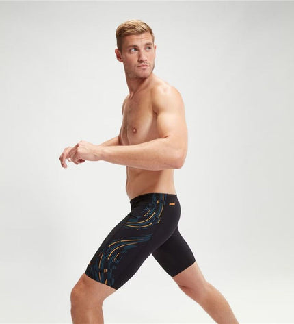 Black Speedo men's swim jammer with tech panel design, suitable for competitive swimming and water sports.