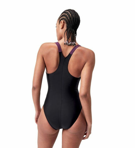 Purple Speedo Hyperboom Splice women's swimsuit for water sports, featuring a sleek, sporty design perfect for outdoor swimming.