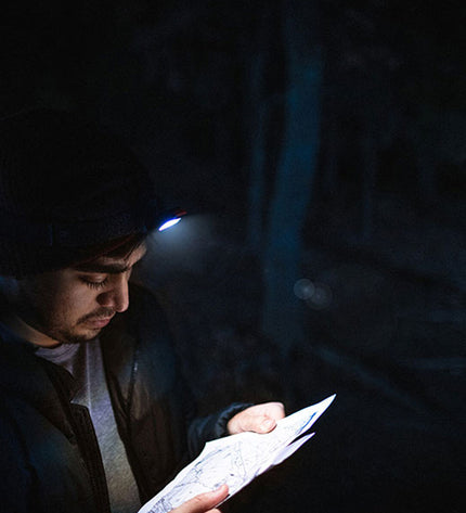 Nebo Einstein™ 1000 Flex headlamp for outdoor activities, with adjustable strap and bright 1000 lumen LED light for camping and hiking.