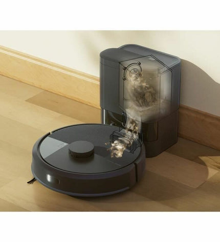 iRobot robot stofzuiger schoonmaakt vloer, met ronde vorm en zwart wit design, geschikt voor huis en schoonmaak.