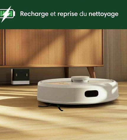 iRobot robot stofzuiger die automatisch vloeren schoonmaakt, zichtbaar met ronde vorm en sensor detectie in een huishouden setting