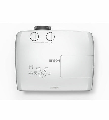 Epson projector V11H961040 displaying a vibrant home theater image on a wall in a modern living room setting.