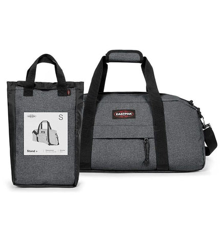 Eastpak sport and outdoor bag in dark gray with sturdy handles and spacious main compartment, ideal for active use.