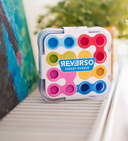Lúdilo Puzzel Lúdilo puzzle toy featuring colorful interlocking pieces for brain-teasing fun and cognitive development.