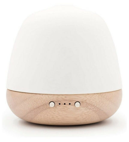 Pranarôm ceramic ultrasonic essential oil diffuser with 180 ml capacity, used for home decor and aromatherapy.
