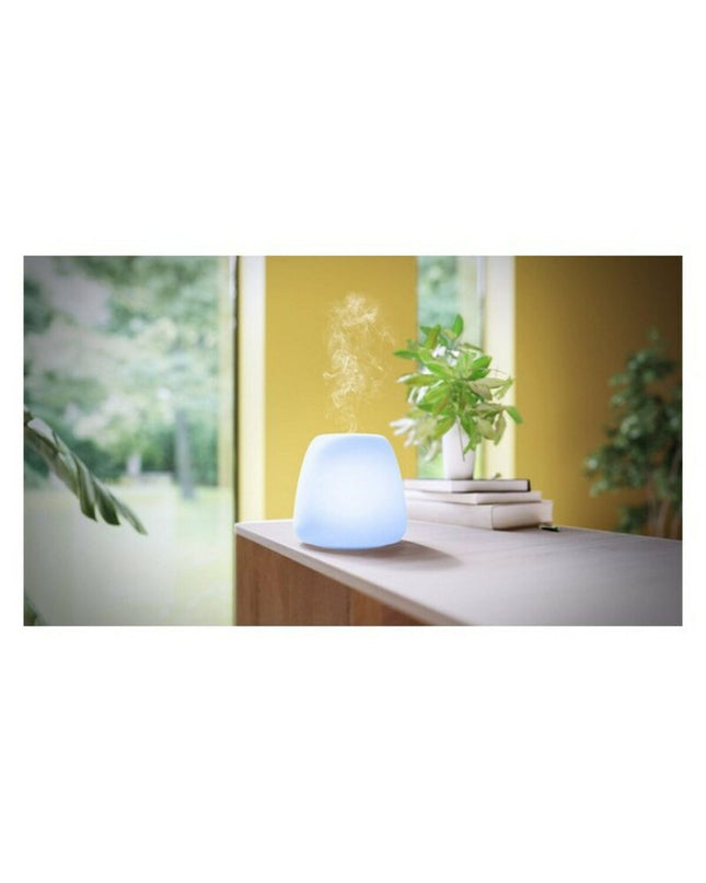Pranarôm Joy ultrasonic essential oil diffuser with glass body and LED light, suitable for home decor and aromatherapy.