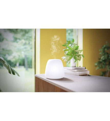 Pranarôm Joy ultrasonic essential oil diffuser with glass design and LED lighting, ideal for home decor and aromatherapy.