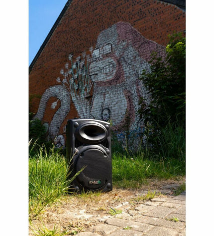 Ledwood PORT8UHF-BT electronic speakers with LED display and Bluetooth connectivity, shown in a modern audio setup.