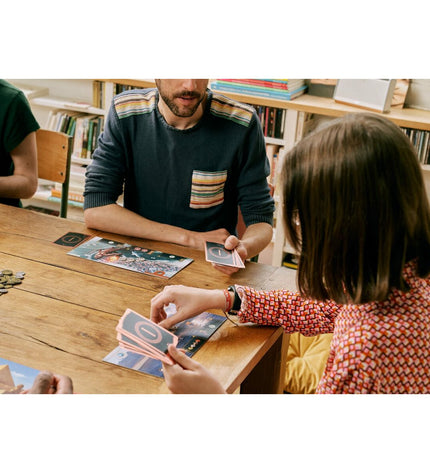 Asmodee 7 Wonders Edifice board game component with colorful cards and game pieces for strategic gameplay.