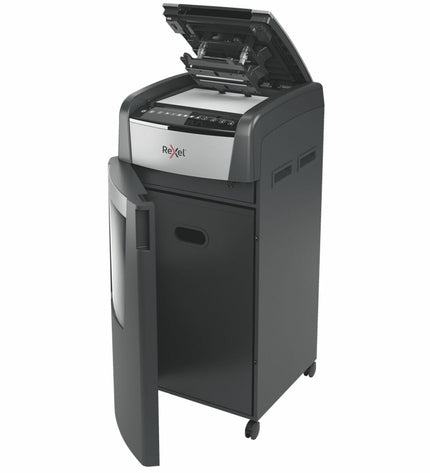 Rexel Optimum AutoFeed 600X paper shredder for office use, showing shredding slot and control panel in a modern office setting.