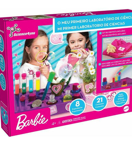 Barbie educational toy game with colorful game pieces and instructions, designed for children to learn and play.