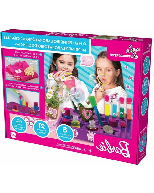Barbie educatief spel with colorful game pieces and instructions, designed for children to learn and play with Barbie-themed educational activities.