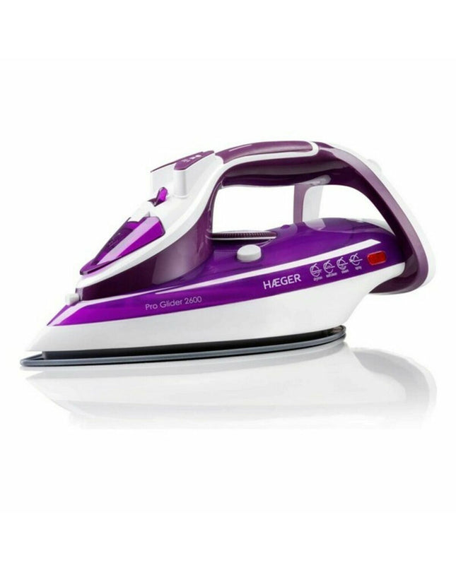 Haeger Pro Glider 2600W steam iron with sleek design, ergonomic handle, and water tank for effective clothing steaming.