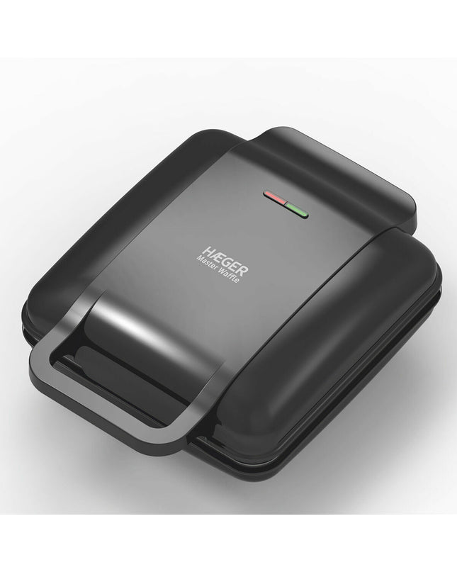 Haeger WM-140.001A waffle maker with 1400W power, compact electric appliance for home cooking, featuring non-stick plates and control dial.