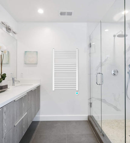Haeger TW-40W.006A electric wall towel rail in bathroom, 80x50 cm, 400W, mounted on tiled wall with towels hanging.