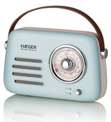 Haeger RB-BLU.002A radio with digital display and control knobs, modern electronic audio and hi-fi equipment.