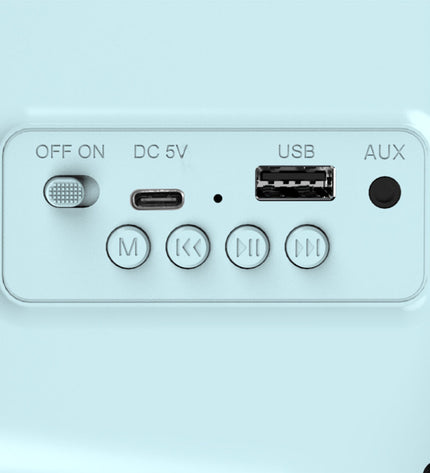 Haeger Radio RB-BLU.002A audio device with blue controls and vintage design, showing front panel and dials.