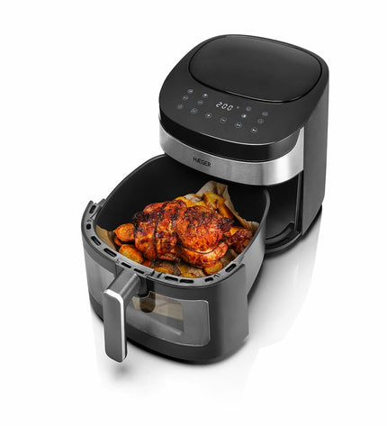 Haeger AF-D80.008A black air fryer with 8L capacity and 1800W power, shown on a kitchen countertop.