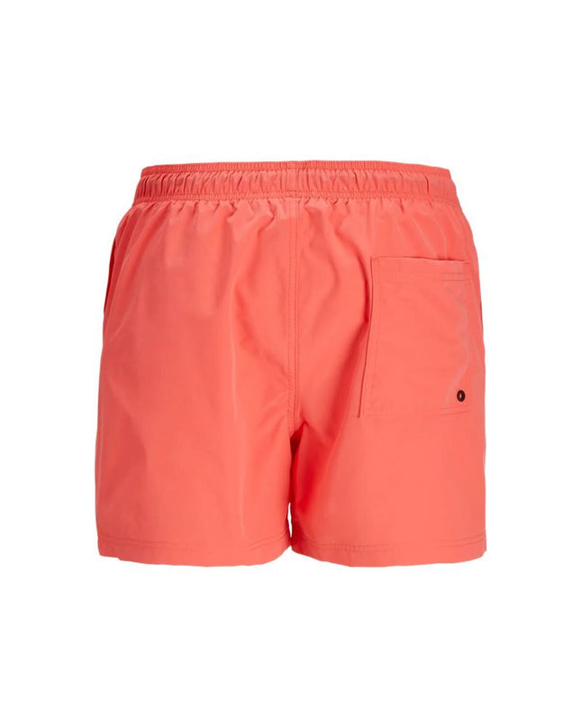 Orange Jack & Jones men's swim trunks in a sporty design, suitable for outdoor watersport activities.