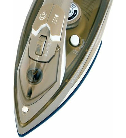 Camry CR 5018 steam iron with 3000W power, white and blue design, shown on a ironing board ready for use.