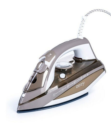 Camry CR 5018 steam iron with 3000W power, shown on a white surface, featuring a water tank and steam control button.
