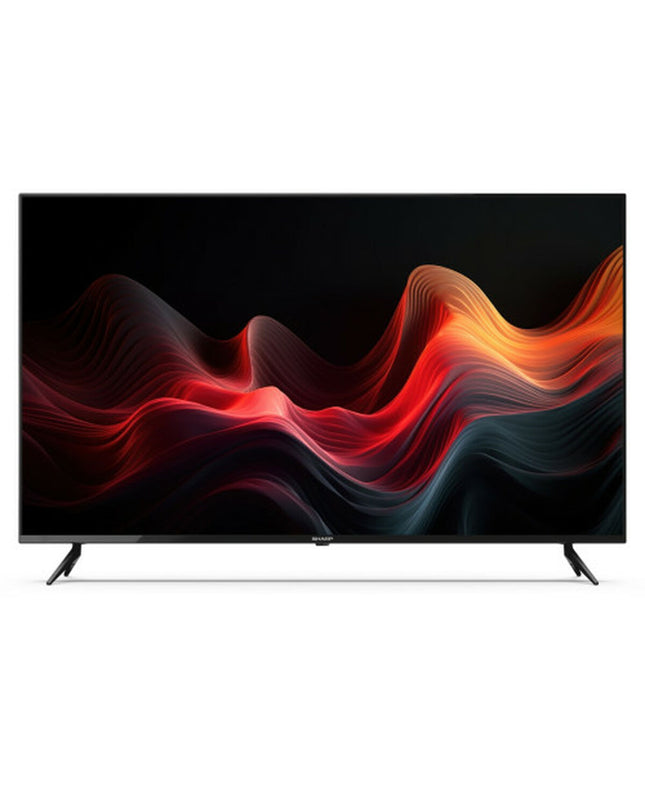 Sharp 50-inch 4K Ultra HD LED Smart TV with HDR, displaying vibrant image on a sleek modern screen in a living room setting.
