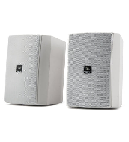 Pair of white JBL XD5 speakers with 100W power output, shown with their sleek design and compact size.